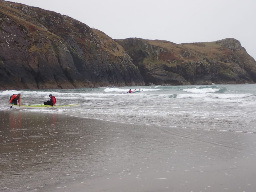 Surf landings w swimmers, Pembrokeshire, Wales, March 2023